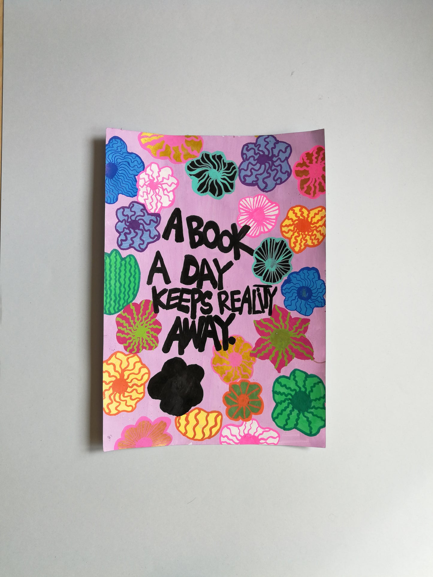 a book a day keeps reality away
