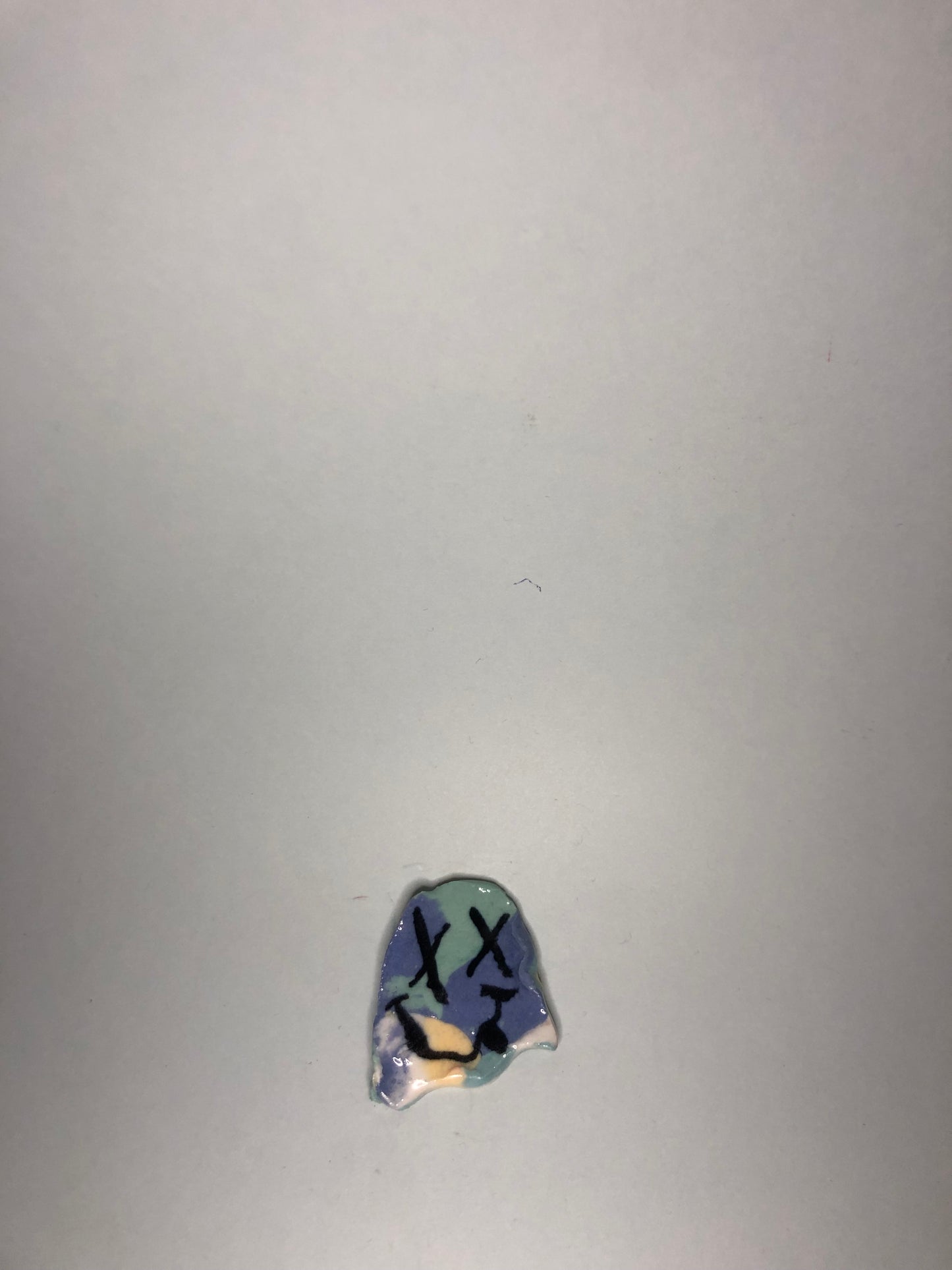 Spökig brosch